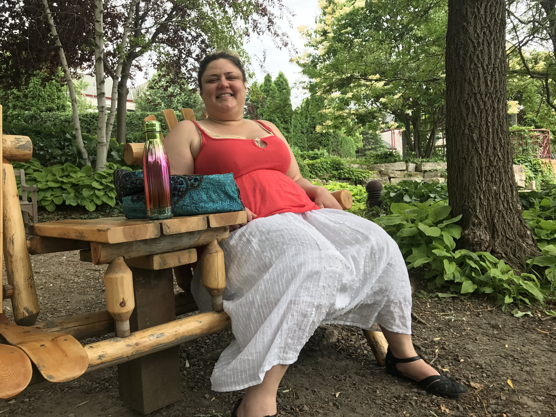 Fayemarie on a wooden garden bench